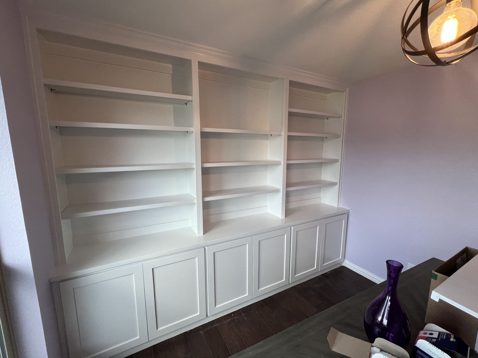 Custom built-in bookshelves with lower cabinets