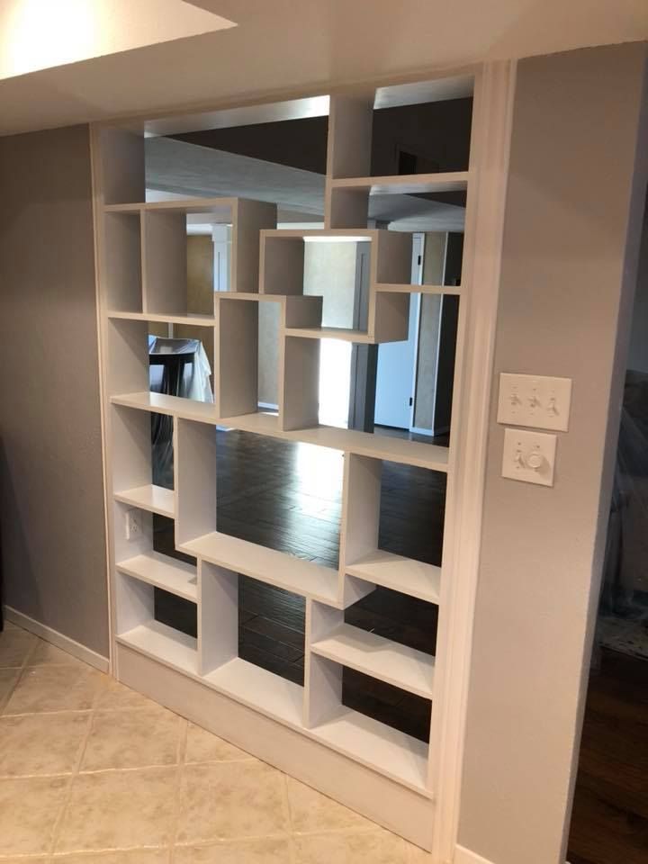 Custom open-shelf room divider millwork