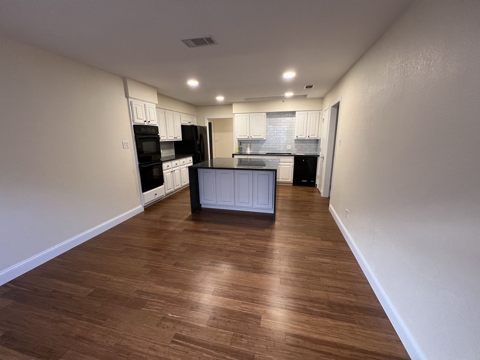 New hardwood flooring through kitchen and hallway