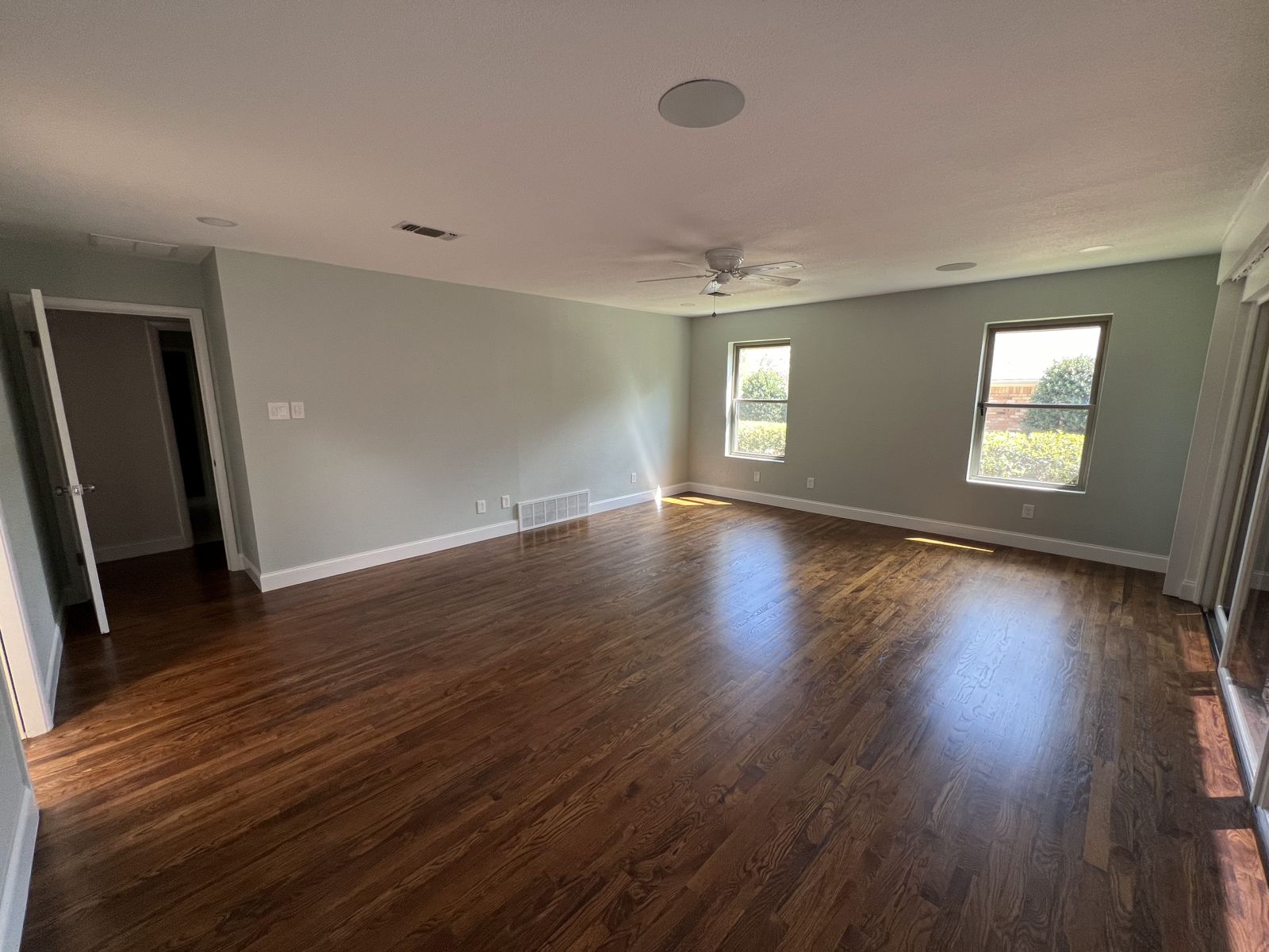 Living room after drywall repair and interior painting